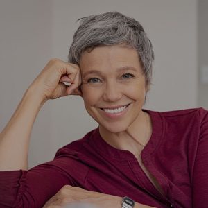 Smiling senior woman with dentures