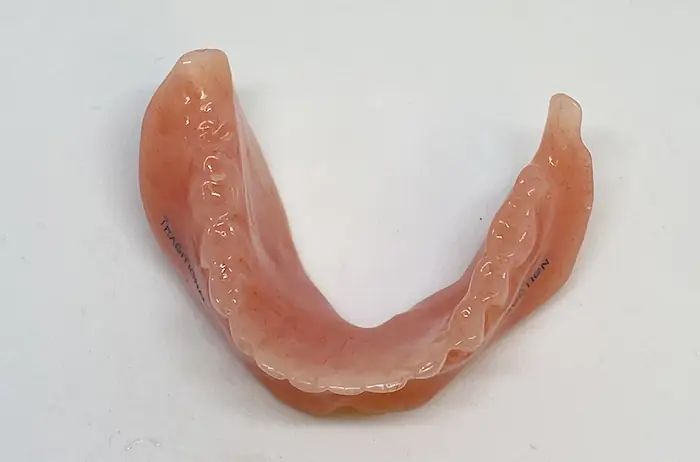 Lower suction denture