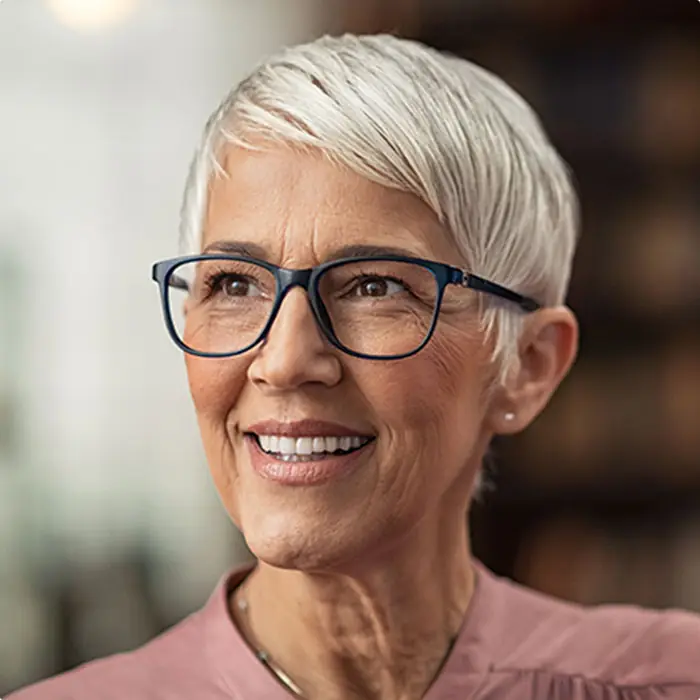Senior woman smiling with her dentures